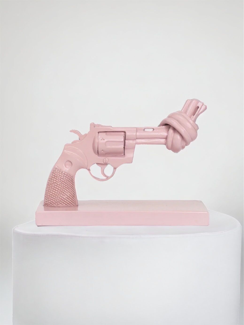 The Knotted Gun shell pink sculpture.