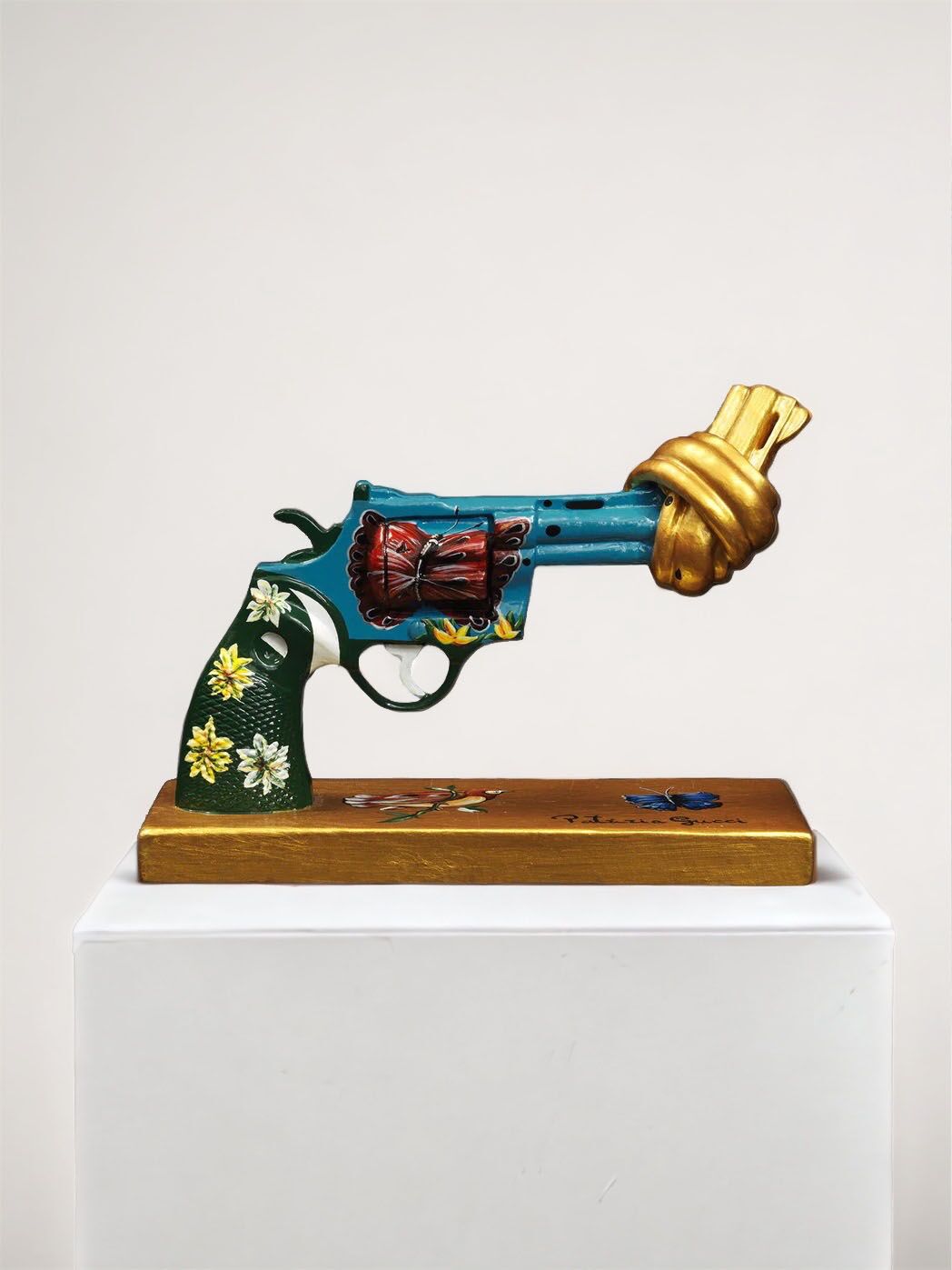 The Knotted Gun p gucci for peace sculpture by non-violence ambassador Patrizia Gucci.